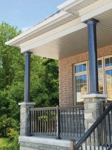 Front Porch With Black Railings And Posts